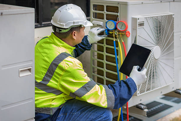 Professional Hvac technician working in Holbrook, MA